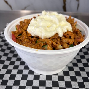chicken shawarma bowl with garlic sauce side view 300x300